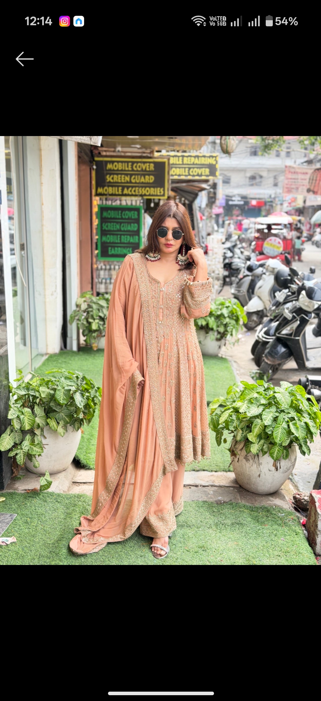 Pakistani style peplum suit with beats work