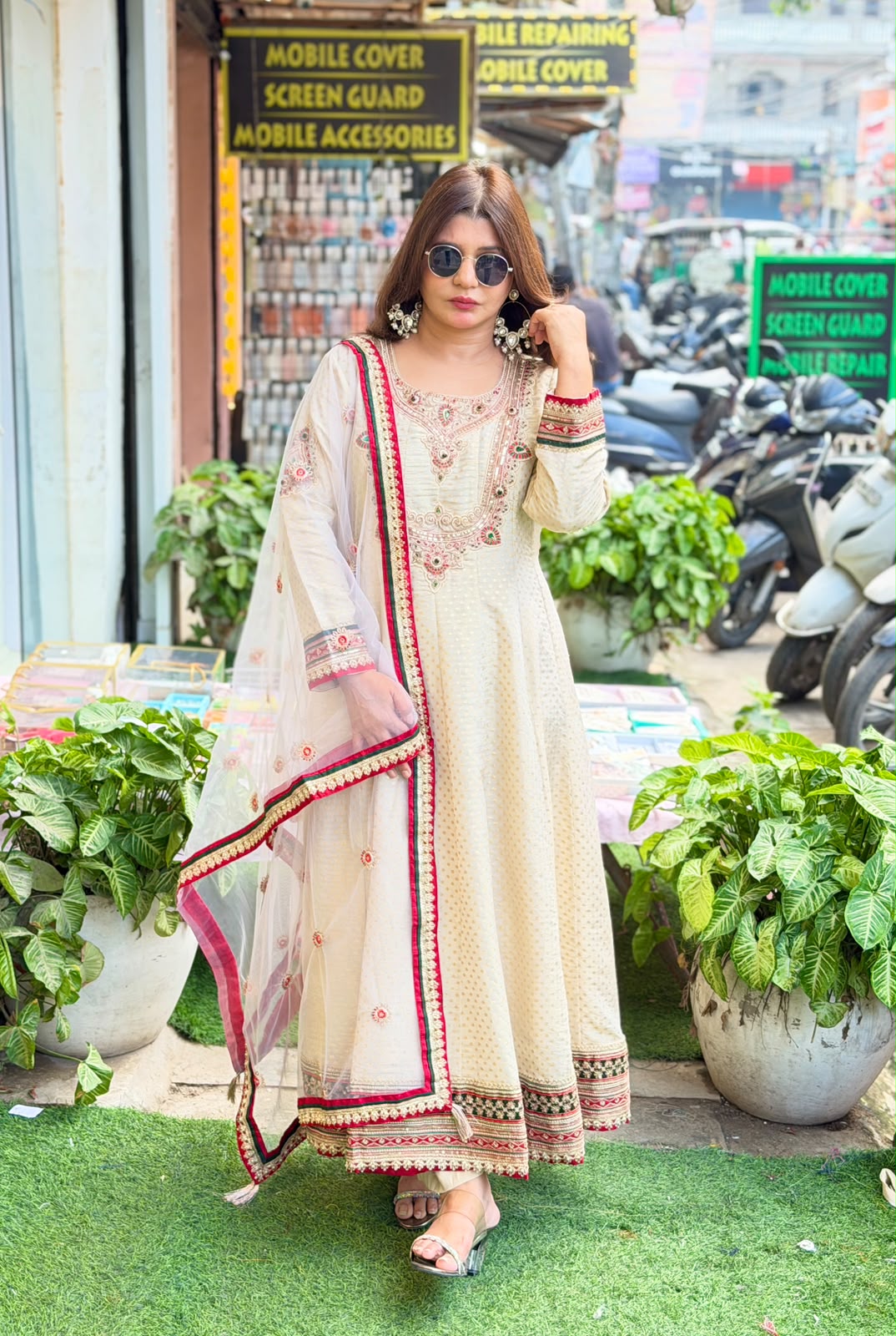 Pure tissue anarkali with antique jewellery work